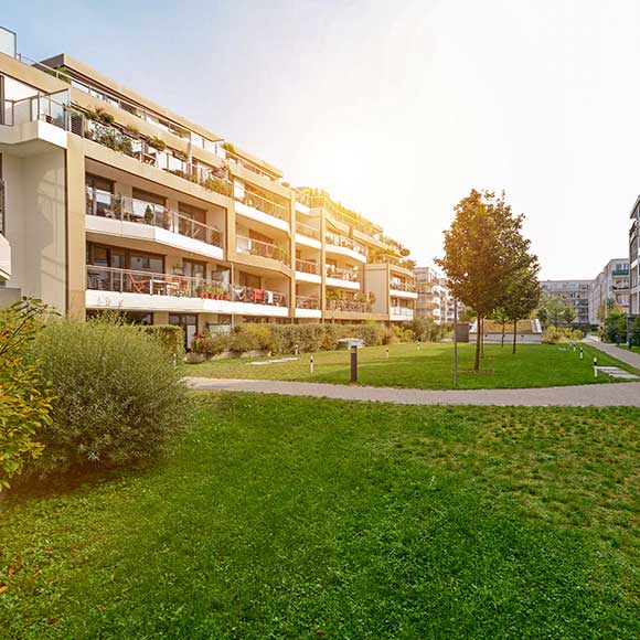 Attractive block of flats in sun to promote Greenfield Risk Solutions Insurance Brokers - Property Insurance - Block of Flates